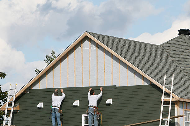 Professional Emergency Siding Repair technician working in Northfield, CT